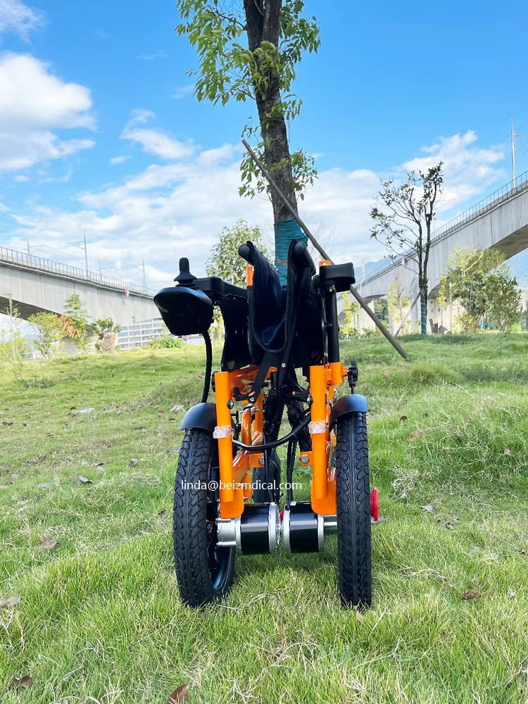 Portable Foldable Electric Wheelchair with Durable Battery and Orange Frame — image 4