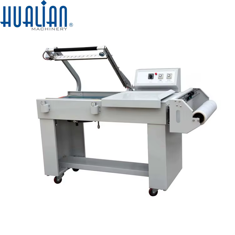 BSL-7560L Hualian Automatic Packaging Wrap PVC Polyolefin Film Shrink Wrapping Machine — image 2