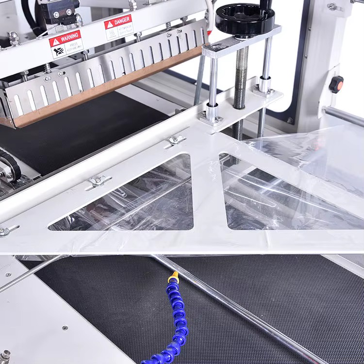 Factory Using Heat Shrink Film Packer — image 3